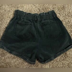 Day + Moon size large black denim shorts.